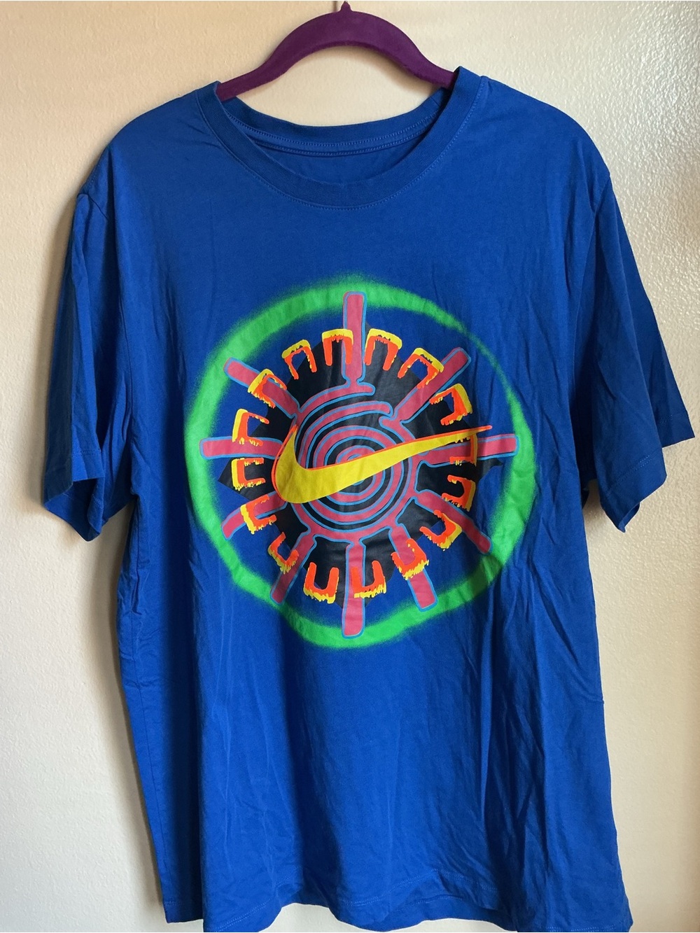 Nike Blue Short-Sleeve Tee with Multicolor Graphic and Yellow Swoosh
